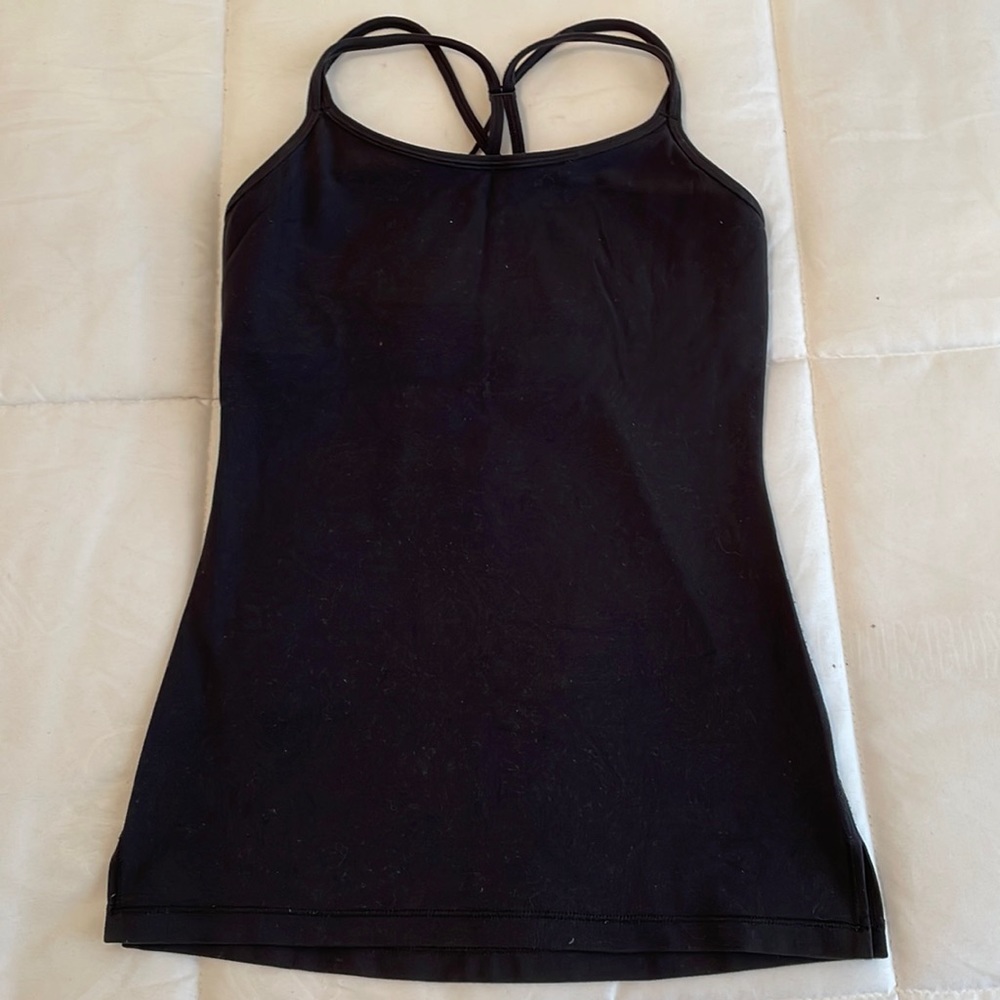 Black Ivivva tank top with built in bra and nice crossover back for girls.